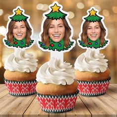 three cupcakes with christmas decorations on them and one has a woman's face