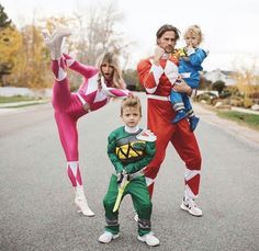 three adults and two children dressed in costumes