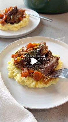 two white plates topped with meat and mashed potatoes