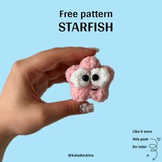 a hand holding a tiny pink and white stuffed animal with the caption free pattern starfish