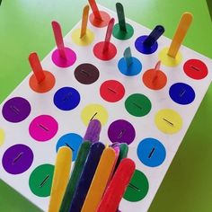 an image of a game that is made out of popsicles and colored paper sticks