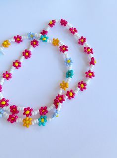 Daisy Chain Anklet Waterproof and perfect for summertime Seed beads strung on stretch chord Knot secured with bead glue Four color options available: *Multicolor (all below colors) *Pink  *Teal *Baby Blue *Orange Anklet stretches over your foot and looks adorable! Easy to put on, stays on, but isn't tricky or difficult to remove.  Toddler tested Cheap Pink Anklets For Festivals, Cheap Pink Round Beads Anklets, Cheap Pink Round Bead Anklets, Whimsical Clothes, Summer Anklets, Beaded Anklet, Beaded Anklets, Daisy Chain, Chain Anklet