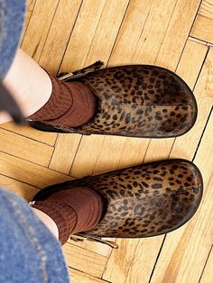 Barefoot clogs with a movable strap. You can wear these leopard print clogs either with a strap around the heel for better fixation, securing it around the ankle, or at the front, like mules. Crafted in pile leather with leopard print, featuring a genuine leather lining inside. A bulky buckle serves as the main accent. Light polyurethane voluminous sole. Round toe. PRODUCT INFORMATION Upper: pile leather with leopard print Lining: leather Sole: anatomical polyurethane sole * the model is undersi Womens Clogs And Mules, Clogs For Women, Birkenstock Style, Accent Light, Clogs And Mules, Clog Shoes, Platform Clogs, Leather Work, Clogs Shoes