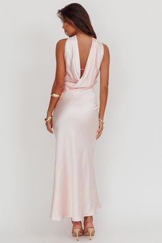 Satin maxi dress Strapless Anti-slip gel on neckline Cowl draped back Built-in bust padding Invisible side zipper No lining Make jaws drop in our gorgeous Damsel maxi dress. It features a low, draped back design and reverse halterneck. It's perfect for a wedding reception or special event. Team it with nude heels and a clutch for an unforgettable look. MODEL INFO Model is wearing size XS Height: 5'10" Bust: 36.0" Waist: 25.5" Hips: 33.0" CARE Hand Wash Cold. Do Not Iron. MATERIAL POLYESTER