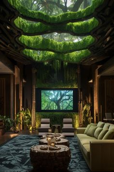 a living room filled with lots of furniture and green plants hanging from the ceiling above