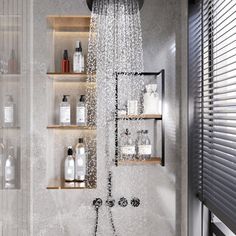 a shower head with water running down it's side and shelves on the wall