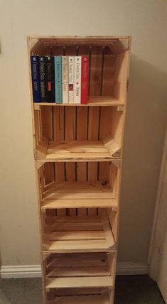 the bookshelf is made out of pallet wood