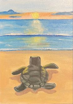 a painting of a turtle on the beach