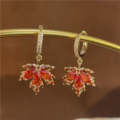 SPECIFICATIONS Style: TRENDY Shape\pattern: PLANT Shape\pattern: Red Maple Leaf Metals Type: Zinc alloy Material: CRYSTAL Item Type: Earrings Earring Type: Drop Earrings Leaf Packaging, Gala Earrings, Earring Luxury, Red Maple Leaf, Tassel Earring, Winter Jewelry, Red Maple, Long Tassel Earrings, Pendant Earring