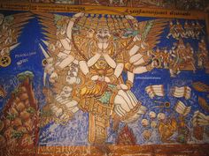 the mural on the wall is depicting deities