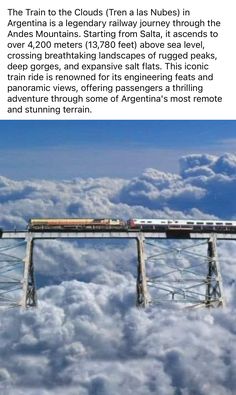 the train is going over the clouds in the sky and there are other things to see