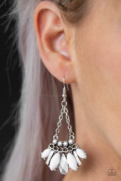 A collision of white marquise beads, sleek silver triangular frames, and a faceted silver teardrop coalesce at the bottom of a studded and chain-link frame for a wild tribal inspired look. Earring attaches to a standard fishhook fitting. Sold as one pair of earrings. P5TR-WTXX-065XX SUMMER PACK EXCLUSIVE 2019 Fish Hook Earrings, Paparazzi Accessories, Paparazzi Jewelry, White Earrings, Silver Earrings Dangle, White Beads, Jewelry Party, Beaded Earrings, Beautiful Jewelry