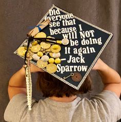 a person wearing a graduation cap that says, dad everyone see that because i will not be doing it again