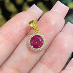 Vintage 18K Solid Gold Ruby & White Topaz Solitaire Pendant...Marked 18K... Total of weights 1.1grams. Measure includes the Bail H 6/8'' W 3/8''.... Measure of stone 7MM...It's in very good condition. Round Gold Gemstones Fine Jewelry, Fine Jewelry Gold Diamond Gemstones, Yellow Gold Gemstones With Halo Setting, Round Yellow Gold Gemstones With Halo Setting, Gold Oval Gemstones With Brilliant Cut, Gold Round Cut Gemstones Fine Jewelry, Round Ruby Gemstones In Yellow Gold, Yellow Gold Ruby Gemstones, Gold Ruby Fine Jewelry Gemstones