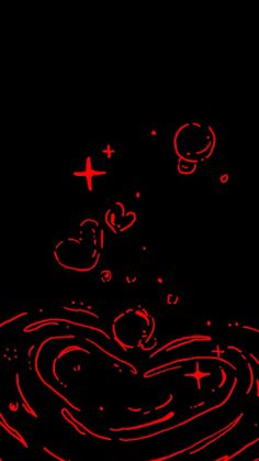 an image of a red heart in the water with bubbles and crosses on black background