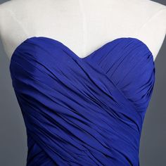 a blue dress on a mannequin head