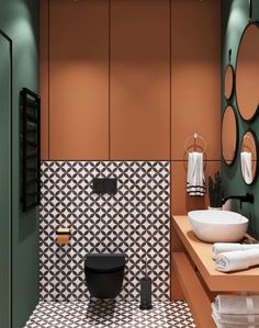 a bathroom with two sinks and mirrors on the wall next to each other in black and white tiles