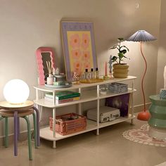 a living room filled with lots of furniture and decor on top of a white table