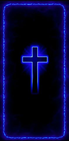 a glowing blue cross in the middle of a square frame on a black background photo