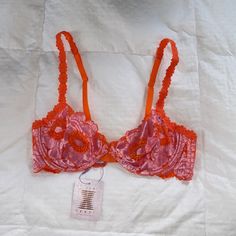 Never Been Worn, Still Has The Original Tags Attached, Savage X Fenty, Matching Brazilian Bottom Available, Demi Bra, Unlined Cups, Plunging Neckline With A Ring At Center Front, Rose Gold-Tone Hardware, Stretch Two-Tone Lace, Floral Poppy Motif, Floral Lace Trim At Front Straps And Underarms, Adjustable Straps, Hook And Eye Back Closure, Colorful, Fun, Orange & Purplish/Pink, In The Color “Pearly Purple Poppylicious Lace”, Sold Out On Website, Size 36c Party Pink Bra With Lace Trim, Fitted Pink Bra For Loungewear, Summer Lace Pink Bra, Blue Lace Bra, Red Bralette, Pink Bralette, Black Lace Bra, Lace Strapless, Savage X Fenty