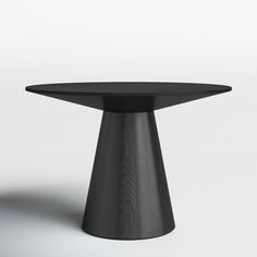 a black round table on a white background