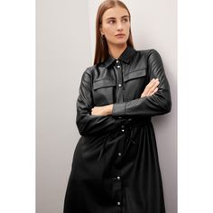 Black faux leather (100% Polyester). A-line. Long sleeve. Collar. Front button closure. 39" from shoulder to hemline. Imported. Collared Business Dresses For Fall, Faux Leather Knee-length Dresses For Fall, Faux Leather Knee-length Fall Dresses, Formal Black Shirt Dress For Fall, Fall Faux Leather Knee-length Dress, Spring Leather Workwear Dress, Leather Midi Dress For Work, Formal Fall Shirt Dress With Button Closure, Spring Leather Dress For Work