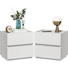 two white nightstands side by side with plants on top