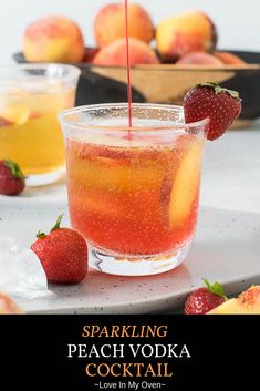 sparkling peach vodka in a glass with strawberries