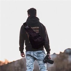 a man with a camera on his back