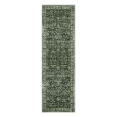 a green rug with an ornate design on the bottom and sides, in front of a white background