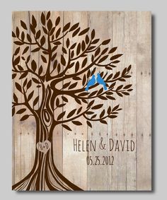 a wooden wall with a blue bird on it and the words, helen & david