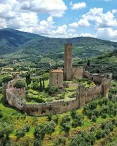 an aerial view of a castle in the countryside