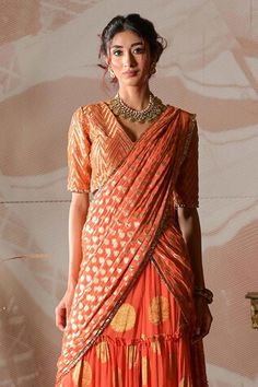 Rust orange banarasi georgette pre-draped sharara saree with circular motifs embroidery. Comes with a banarasi brocade blouse with cutdana hand work. - Aza Fashions Festive Draped Sets With Zari Work, Navratri Pre-draped Saree With Cutdana, Festive Draped Semi-stitched Choli, Designer Pre-draped Saree With Traditional Drape, Designer Draped Sharara For Diwali, Designer Wear Pre-draped Saree For Diwali, Designer Wear Pre-draped Saree For Festivals, Festive Draped Art Silk Sets, Draped Zari Work Sets For Diwali