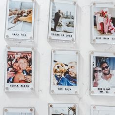 several polaroid pictures hanging on the wall with people's names and photos attached to them