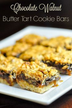 chocolate walnut butter tart cookie bars on a white plate