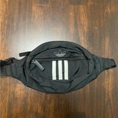 Adidas Hip/Fanny Pack. New Without Tags. Questions? Leave A Comment Below! White Adidas Bag For Streetwear, Adidas White Bag For Streetwear, Adidas White Streetwear Bag, Casual Black Nylon Belt Bag, Casual Adidas Nylon Bags, Adidas Bags, Hip Pack, Adidas Black, Mini Bags