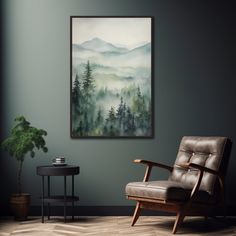 a chair and table in a room with a painting on the wall above it,