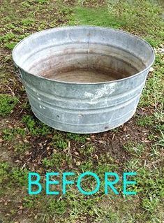 an old metal tub sitting on the ground with grass and dirt around it, before and after cleaning