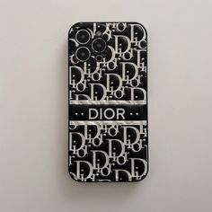 a cell phone case with the word dior printed on it's back cover