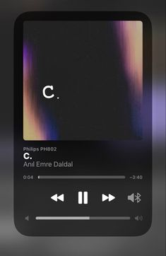 an audio player with the letter c on it's screen and music playing buttons