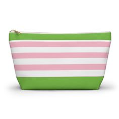 Add a stylish touch to your beauty routine with this adorable pink stripe makeup bag! Perfect for storing your favorite cosmetics and beauty essentials, this bag is both functional and fashionable. The pink stripes add a fun pop of color, while the spacious interior is ideal for keeping your makeup organized on the go.  Whether you're traveling or simply looking to stay organized at home, this makeup bag is a must-have accessory for any makeup lover. Treat yourself to this chic and practical pink stripe makeup bag today! ⭐Accessory Pouch Details:      -Materials:  100% polyester      -T-bottom      -non woven laminate interior      -pouch as durable zipper closure with a gold color pull      -sizes: small-length  in 8.66  Width, in 2.36  Height, in 4.72               Large- length, in. 12. Stripe Makeup, Travel In Style, Chic Pink, Makeup Organizer, Style Pink, Makeup Bags Travel, Accessory Pouch, Cosmetic Pouch, Beauty Routine