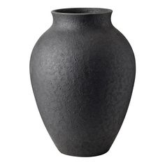 a black vase is shown on a white background