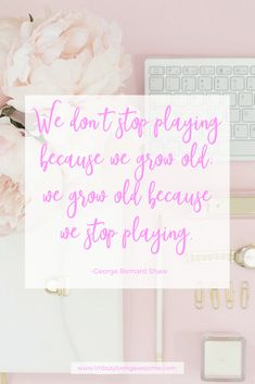 a pink desk with flowers, keyboard and mouse in the background text reads we don't stop playing because we grow old we grow old because we do because we stop playing