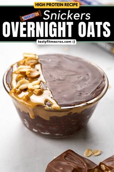 there is a chocolate dessert with peanut butter on top and the words, snickkers overnight oats