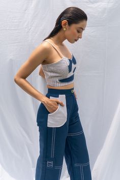 Legion blue corset with patchwork and kantha embroidery. Paired with matching embroidered pant. - Aza Fashions Blue Cotton Patchwork Sets, Fitted Patchwork Pants For Summer, Summer Fitted Patchwork Pants, Patchwork Corset, Geometric Sleeve, Kantha Embroidery, Blue Corset, Pant For Women, Embroidered Pants