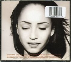 an album cover with a woman's face and barcode on the back of it