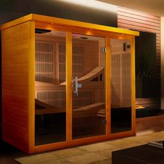 an indoor sauna is lit up at night