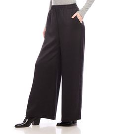 Effortlessly chic and versatile, our wide leg pants are made of luxurious satin material and come in a fashionable full length design.. Available in both black and cognac colors, these pants are the perfect addition to your fall wardrobe. Embrace comfort and style with our must-have pants. Recycled Satin: 55% Polyester 45% Recycled Polyester Made in the USA of Imported Fabric Dry Clean Only Length: Full length Elasticized waistband Front rise: 13 1/8 inches (size M) Inseam: 29 1/4 inches (all si Versatile High-waisted Viscose Pants, Viscose Wide Leg Bottoms For Fall, Fall Wide Leg Viscose Bottoms, Wide Leg Viscose Bottoms For Fall, Casual Silk Wide Leg Pants With Elastic Waistband, High-waisted Viscose Bottoms For Fall, Viscose High-waisted Pants For Fall, Fall Viscose Wide Leg Work Pants, Chic Viscose Wide Leg Pants For Fall