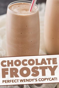 chocolate frosty in a tall glass with a straw