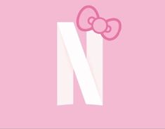 the letter n has a pink bow on it